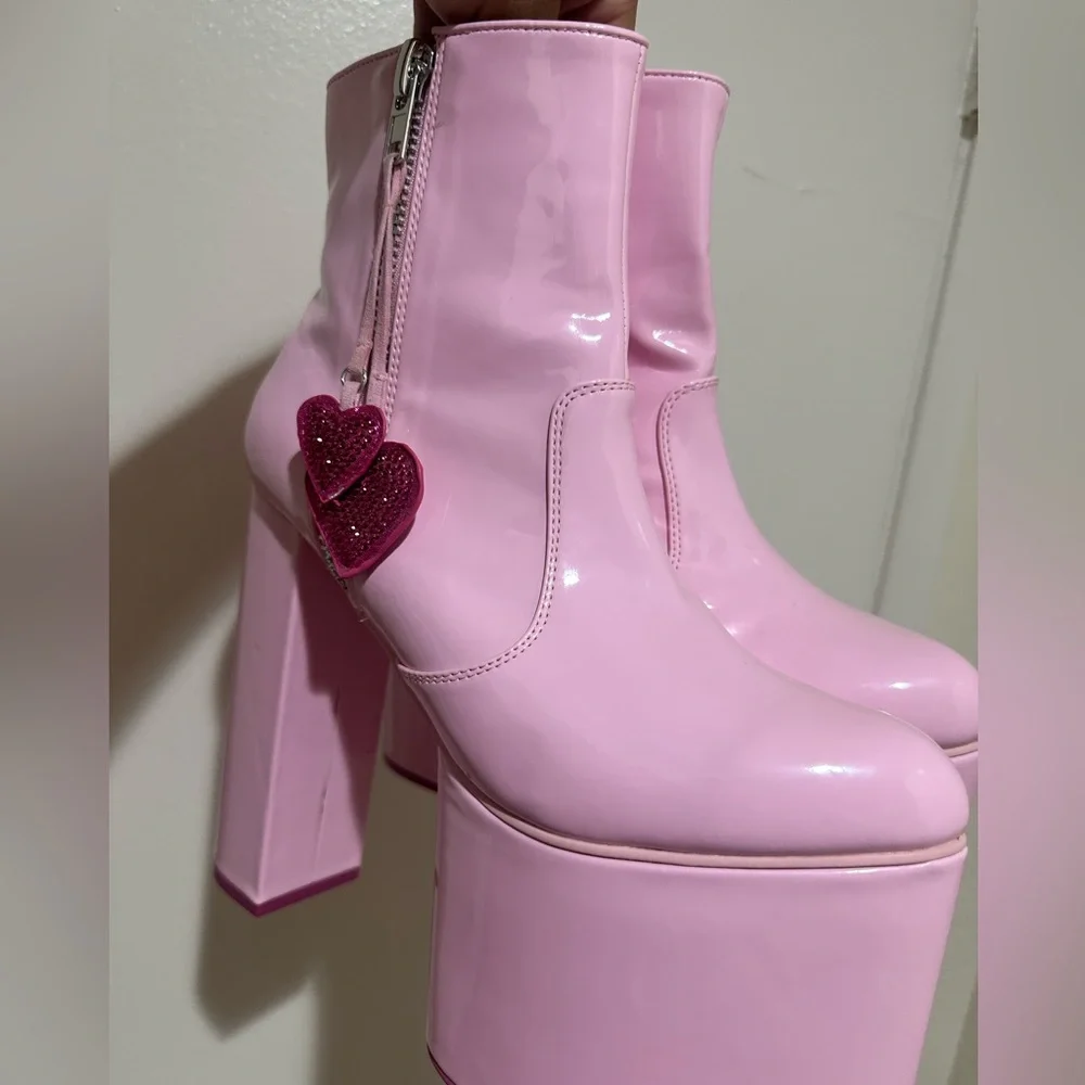 Dolls Kill Glossy Pink Platform Boots with Heart Accents